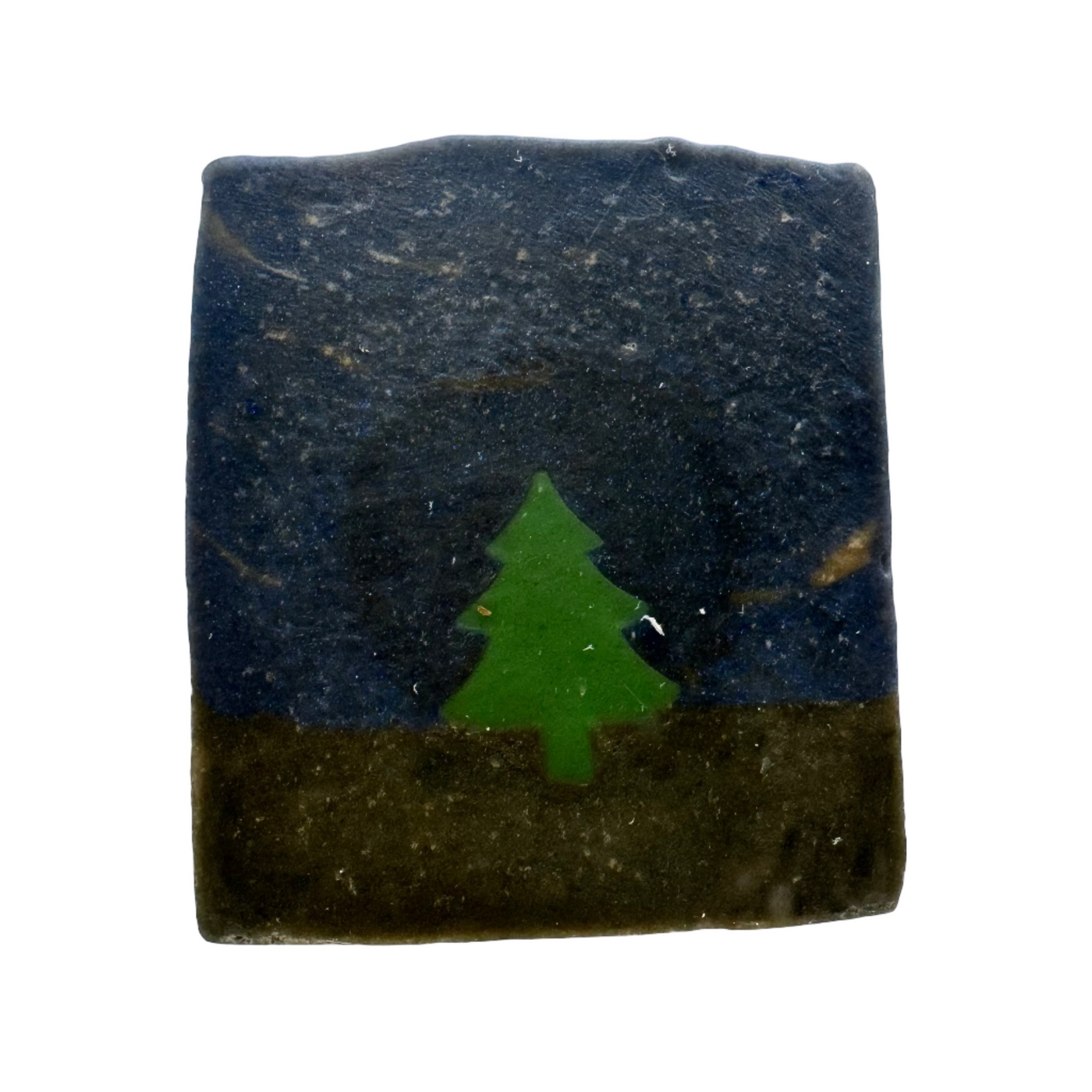 Bar of soap with a green tree design on a white background