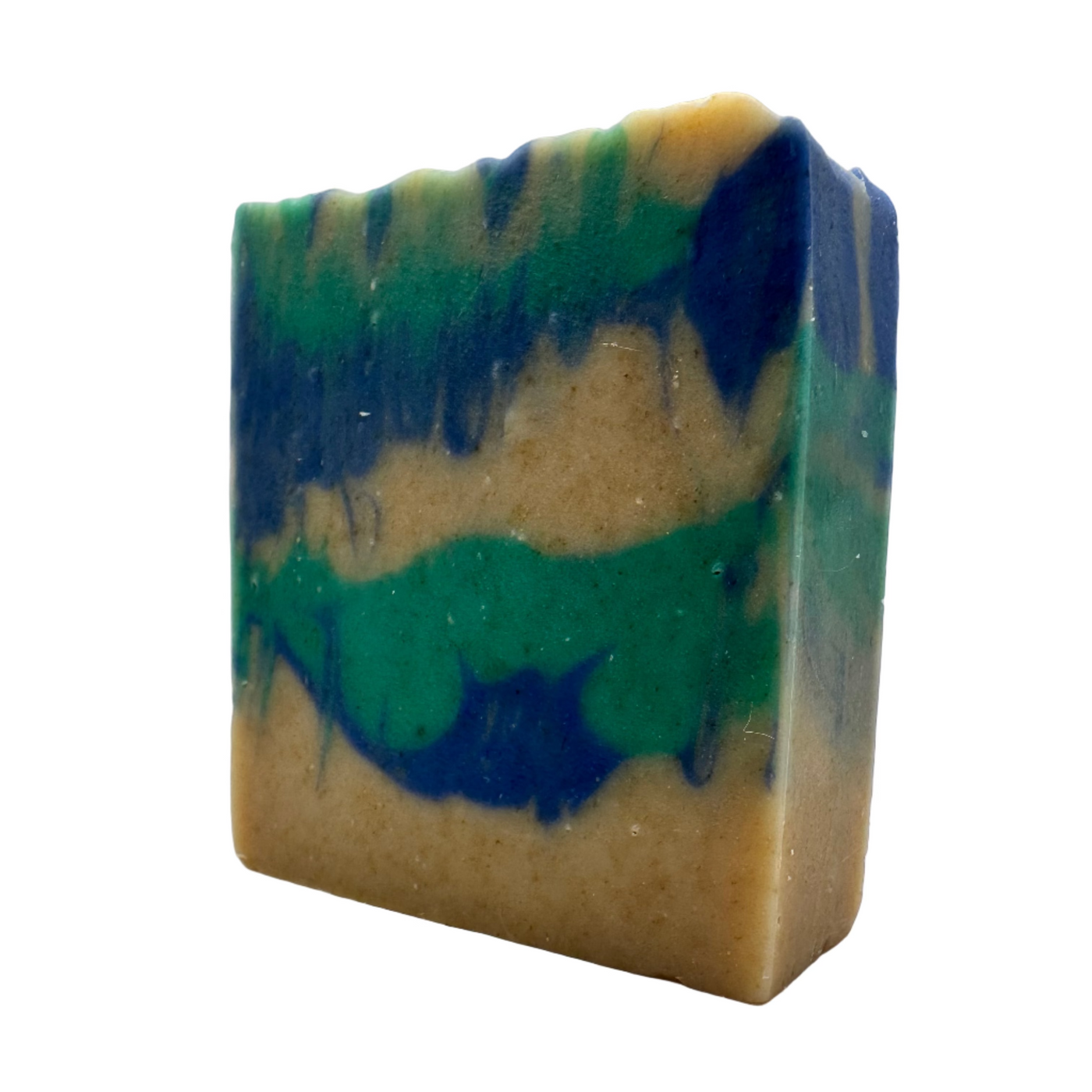Multicolored soap bar with green, blue, and beige hues on a white background